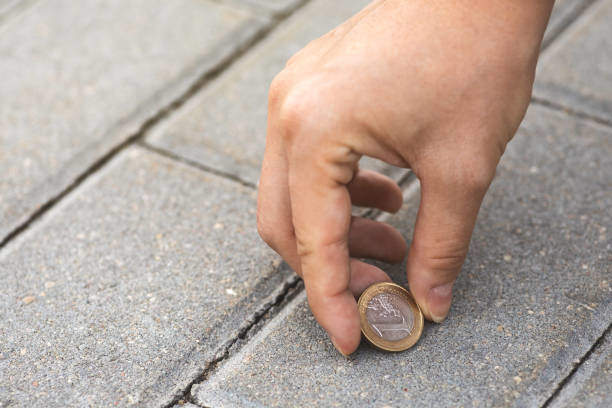 spiritual meaning of finding coins on the ground