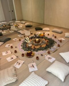 Priest Nduga performing African New Year good luck rituals with herbs and fire.